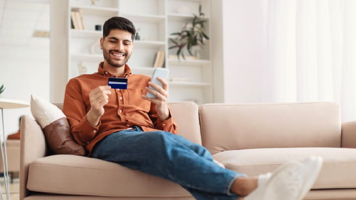 man holding a credit card