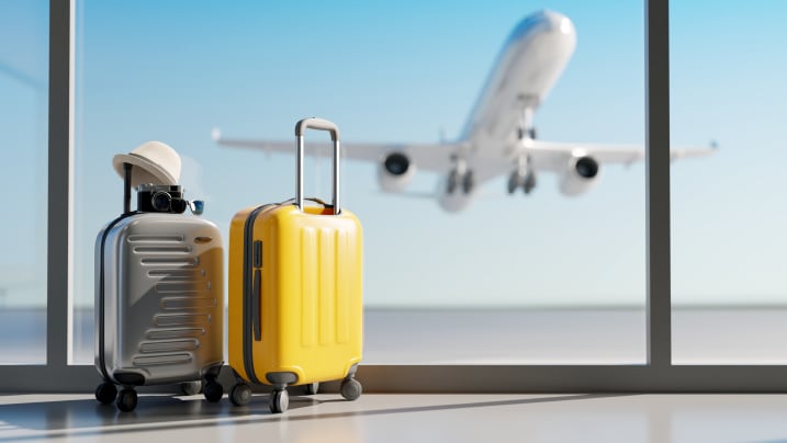 suitcases in airport travel concept