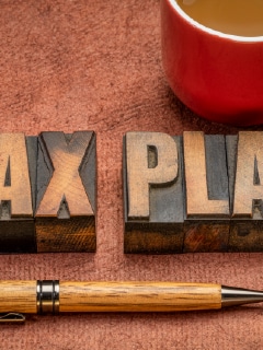 A graphic featuring the concept of tax planning and exemptions