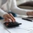 woman paying bills online