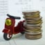 coins stacked together with a bike toy