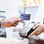 a person performing a credit card transaction
