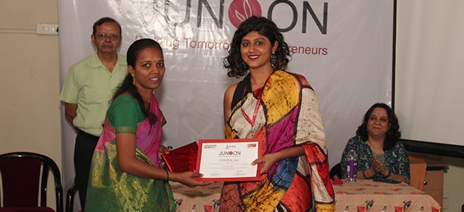 Ms. Rachana Iyer, Head - Corporate Social Responsibility, IDFC FIRST Bank handing over completion certificate to Ms. Manisha for completing Junoon Entrepreneurship Development Program.