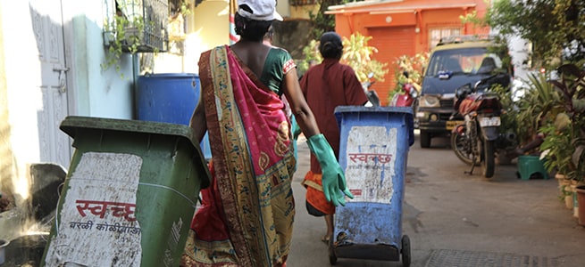 Women from Stree Mukti Sanghatana on their way to begin door-step collection of segregated waste in Worli Koliwada