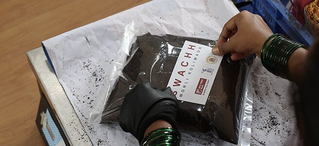 Compost, which is made from wet waste collected under Swachh Worli Koliwada is packaged for sale