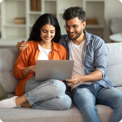 Couple Sitting on Sofa