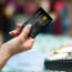person holding a credit card