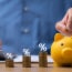 man saving money in a piggybank