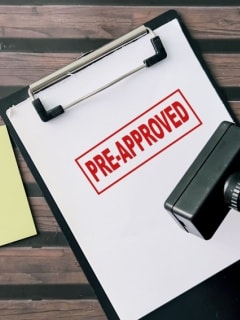 Person checking pre-approved loan offer