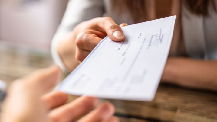 Illustration of the Positive Pay System process ensuring secure cheque transactions in banking